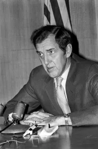 Senator Edmund Muskie answers questions at his London press conference