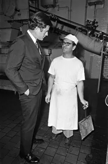 Talking Prints: Senator Edward Kennedy seen here chatting to a member of the work force during his tour