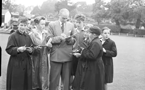 01016 Prints: September 1957 Northants and England batsman Dennis Brooks surrounded by autograph