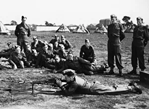 Bren Gun Prints: A Sergeant instructor demonstrating to recruits the working of a Bren-Gun