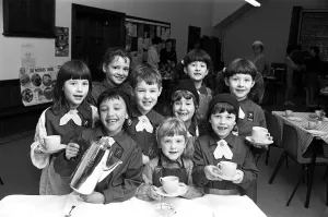 00592 Prints: Service with a smile... pouring out the coffees are these Slaithwaite Brownies who raised