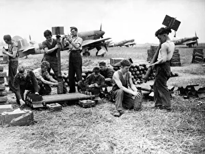 Air Force Prints: Servicing commandos of the RAF have a busy time on the Normandy airfields assembling