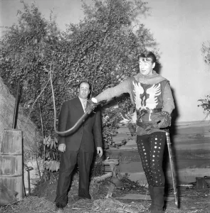 On set with the cast of the television series The Adventures of Sir Lancelot