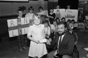 Money Prints: Seven-year old Adele Brooke presents a £588 cheque from Dalton Junior School to Mr