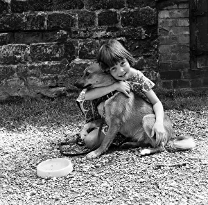 Seven-year-old Sheena Broom with the Corgi cross puppy which was found watching lorries