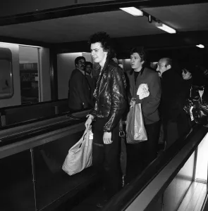 The Sex Pistols at Heathrow Airport before flying off for an American tour