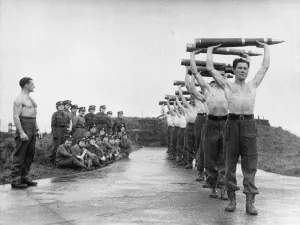 Weight Lifting Prints: Sgt Major Murray (left) a former Olympic weight lifting champion of Scotland