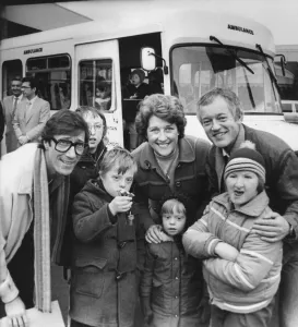 The Shadowss Hank Marvin at the bus handover with (l-r) Neal Armstrong, 13