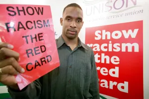 00905 Prints: Shaka Hislop, Red card on Racism at Gosforth High School. 6th February 1998