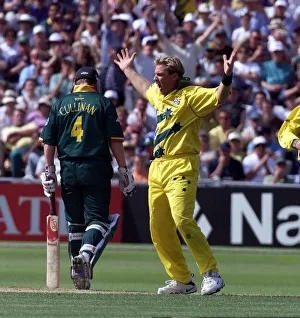 00274 Prints: Shane Warne of Australia celebrates after taking the wicket Hansie Cronjie against South