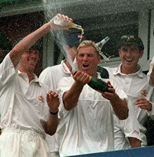 Shane Warne celebrates Australias win July 1997 by spraying bottle of