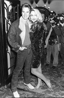 Shaun Cassidy Actor and Jerry Hall supermodel stand inside the Lyric Theatre in London