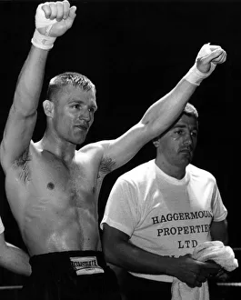 01362 Prints: Shea Neary downs opponent Simon Frd then salutes his excellent victory