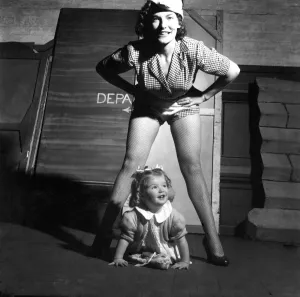 Sheila Hannaway, principal boy in Dick Whittington at Glasgow with her 2 year old