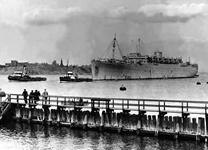 Tugs Prints: The ship Georgic arrives at the River Tyne for reconversion at a North East shipyard