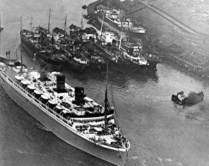 00094 Prints: The Ship Monarch of Bermuda now named Arkadia on right passing Tyne Dock on the River