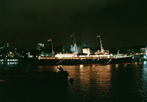 00131 Prints: Ships Royal Yacht Britannia moored at Tower Bridge in London November 1997