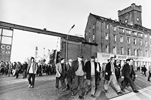 Shipyard Prints: Shipyard workers, engineers and boilermakers leave after the first day at work at Scott