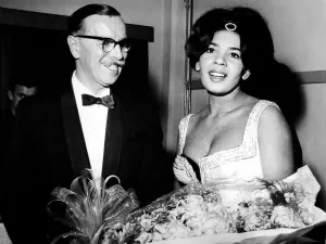 Bouquet Prints: Shirley Bassey is presented with flowers by the General Manager of the Capitol Theatre