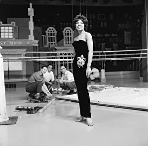 Shirley Bassey wearing the hip-hugging black velvet dress that she says catches mens