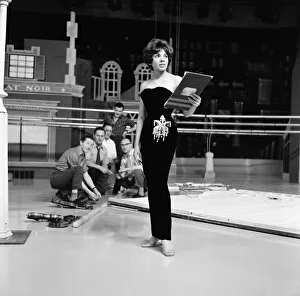 Shirley Bassey wearing the hip-hugging black velvet dress that she says catches mens