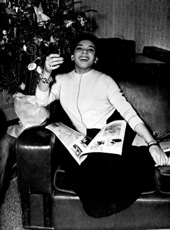 Magazine Prints: Shirley Bassey - The Welsh singer sensation salutes 1957 with her glass held high