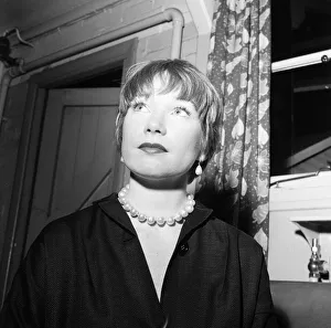 00804 Prints: Shirley MacLaine, pictured at London Heathrow Airport, 21st August 1960