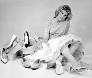 00089 Prints: Shoes Shoes Shoes, Sunday People model tries on the latest 1959 footwear fashions