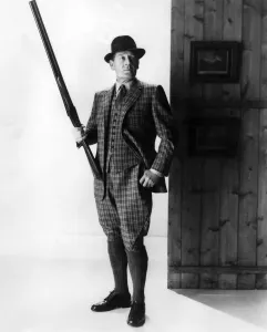 Hunter Prints: This shooting suit, in green, brown, gold and black check scottish cheviot