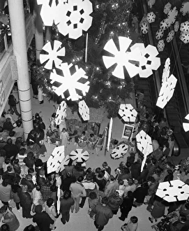00888 Prints: Shoppers admiring the Christmas display in the Broad Street Shopping Centre following