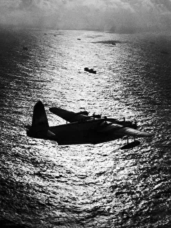 Shorts Sunderland Flying Boat of the RAF Coastal Command patrols above an Atlantic