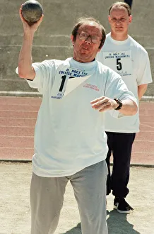 Shot put at the annual sports day at Clairville Stadium for people with special needs