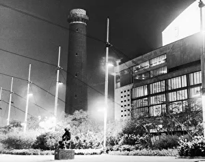Illumination Prints: The Shot Tower on the South Bank of the River Thames stands surrounded by the bright