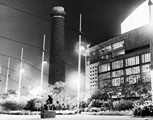 Illumination Prints: The Shot Tower on the South Bank of the River Thames stands surrounded by the bright
