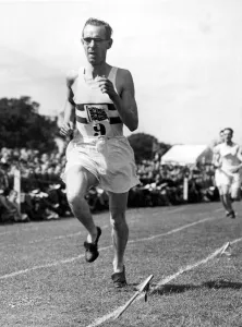 00086 Prints: Sidney Wooderson winning the Lyons Sports Mile with a time of 4 minutes 19 seconds