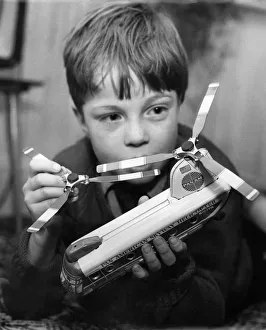 00049 Prints: Simon Robins, 11, of Scunthorpe: Helicopter rotor off. Part fallen inside. P004790