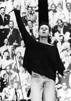 Simple Minds rock band Jim Kerr celebrating Nelson Mandelas 70th birthday at Wembley