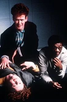 Simply Red lead singer Mick Hucknall with other members of the group