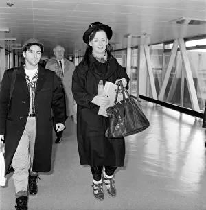 00357 Prints: Singer Boy George from the Culture Club group leaving Heathrow airport for New York