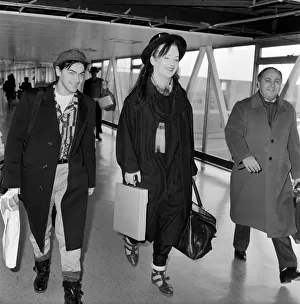 00357 Prints: Singer Boy George from the Culture Club group leaving Heathrow airport for New York