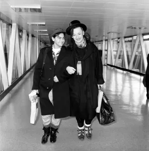 00357 Prints: Singer Boy George from the Culture Club group leaving Heathrow airport for New York