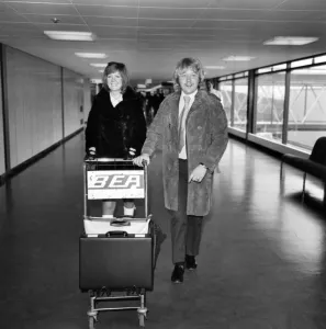 Arrivals Prints: Singer Cilla Black pictured at Heathrow airport with her husband Bobby
