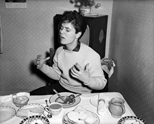 Singer Cliff Richard, photographed at his digs for a Donald Zec feature