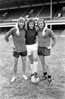 Singer David Essex pictured at Upton Park with footballers Billy Bonds