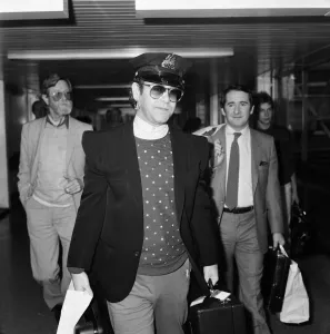 Singer Elton John, arrives at Heathrow airport from his 10 week tour of the States