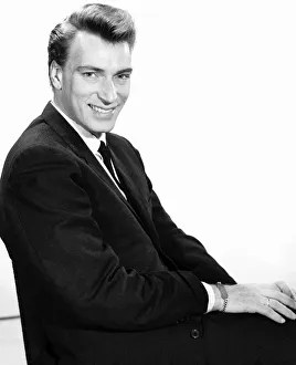 Singer Frank Ifield seen here posing for the Reveille newspaper for a fashion feature