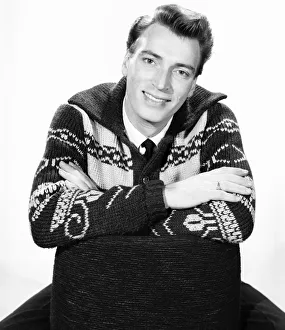 Knitwear Prints: Singer Frank Ifield seen here posing for the Reveille newspaper for a fashion feature