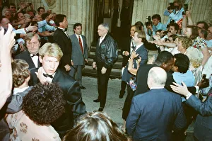 Singer Frank Sinarta is mobbed by waiting fans as he arrives at the Royal Albert Hall to