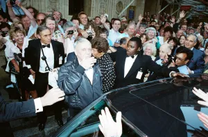 Singer Frank Sinarta is mobbed by waiting fans as he arrives at the Royal Albert Hall to