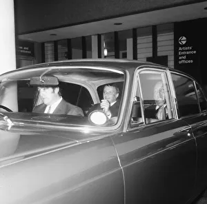 00303 Prints: Singer Frank Sinatra pictured as he left the Festival Hall by Jaguar car with the rear
